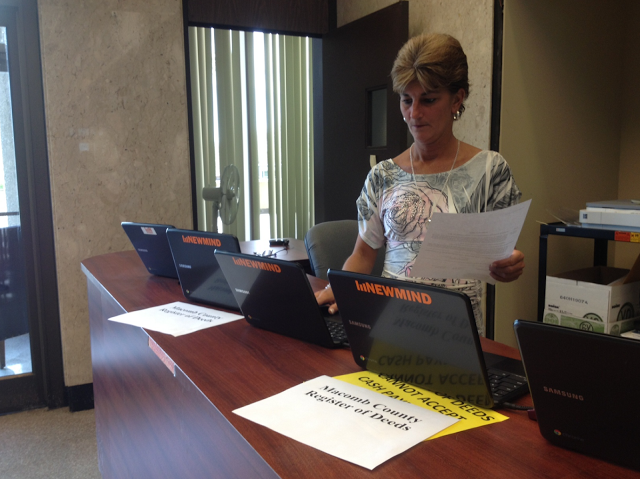 Having never used a Chromebook before, and having no IT background, Macomb County Register of Deeds employee Traci Thompson became the department’s Chromebook administrator after a 15-minute crash-course on connecting to the wireless network. This photo shows Chromebooks provided by Newmind at the temporary Register of Deeds public search counter in the Court Building.